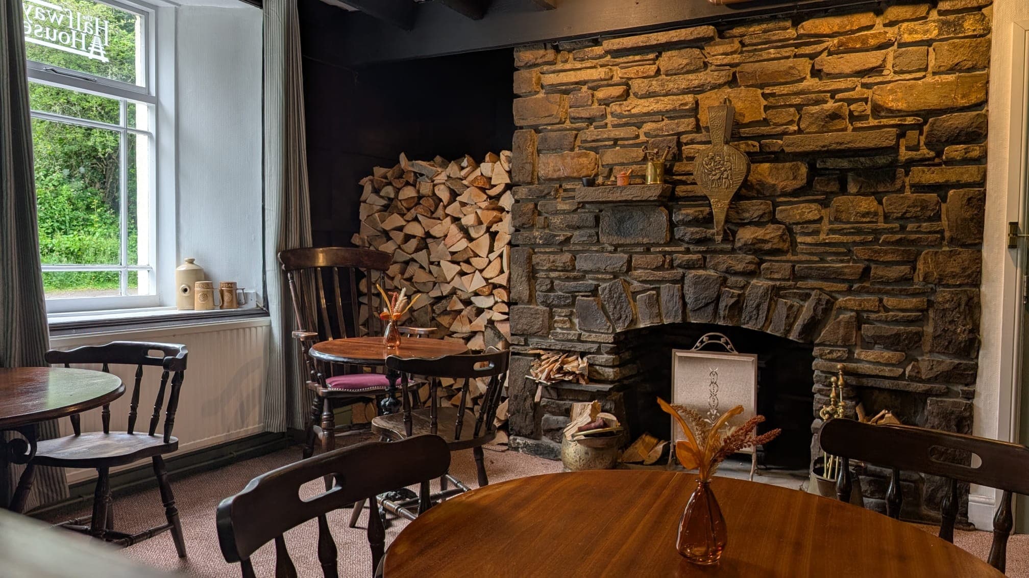 Cosy fireplace inside The Halfway House pub, Blackwood